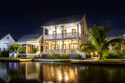 1543 — Elegant Turn-Key Home in Gated Mahogany Bay Village with Canal-frontage and Boat-slip. Classic Cape Cod Sophistication in a Modern Caribbean Community, 🇧🇿 Belize