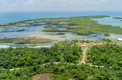 1041 – 1.786-Acre Canal-Front Lot in Red Rock Belize – Exceptional Waterfront Investment Opportunity, 🇧🇿 Belize